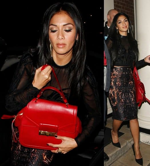 Nicole Scherzinger totes a fabulous red structured handbag