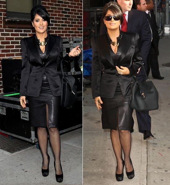 Salma Hayek was seen in a sultry, Cushnie et Ochs Pre-Fall 2012 little black dress with a deep neckline and central slit, complemented by Giuseppe Zanotti black pumps, fishnet tights, a chunky black chain with gold YSL padlock, a Balenciaga 'Tube' bag, and sunglasses