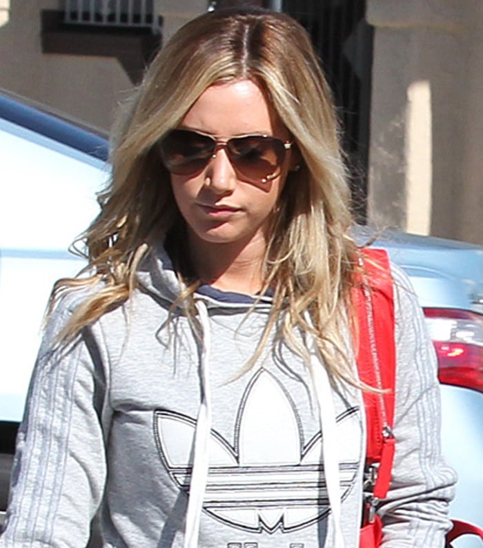 Ashley Tisdale wears her hair down as she heads to her polling location