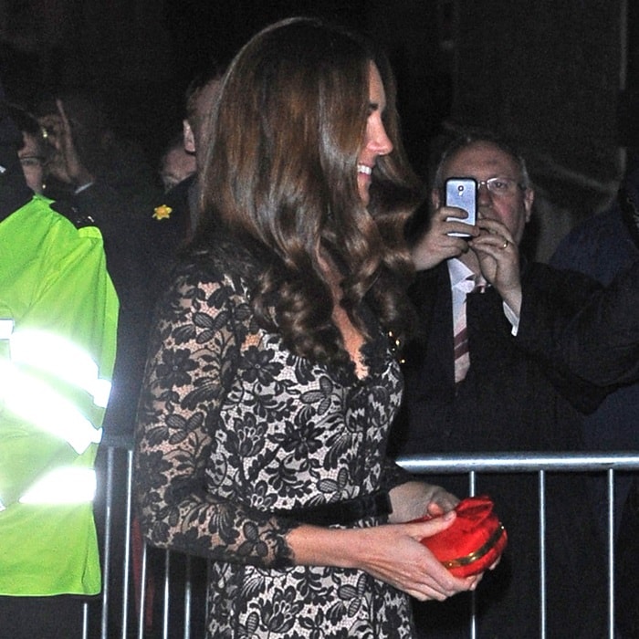 Graceful Elegance: Kate Middleton shines in her beloved black lace gown, a testament to timeless style and sophistication