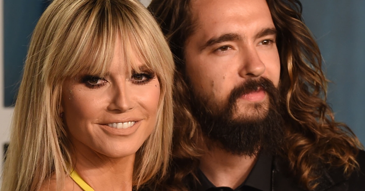 Heidi Klum Shocks in Yellow Breast Pump Dress at Oscar Party