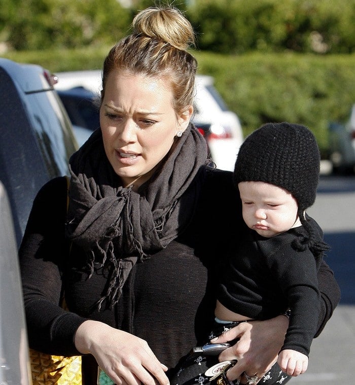 Hilary Duff wears her hair up as she grocery shops with her son, Luca Cruz Comrie