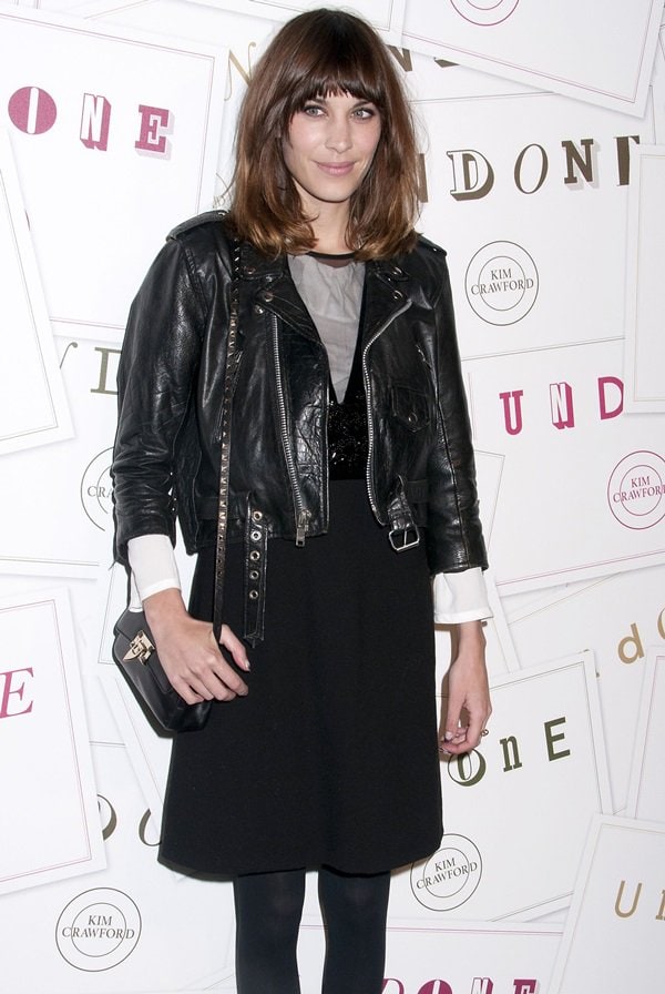 Alexa Chung shows how to pair a leather jacket with a matching dress