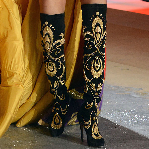 Adriana Lima wears black embellished boots by Nicholas Kirkwood