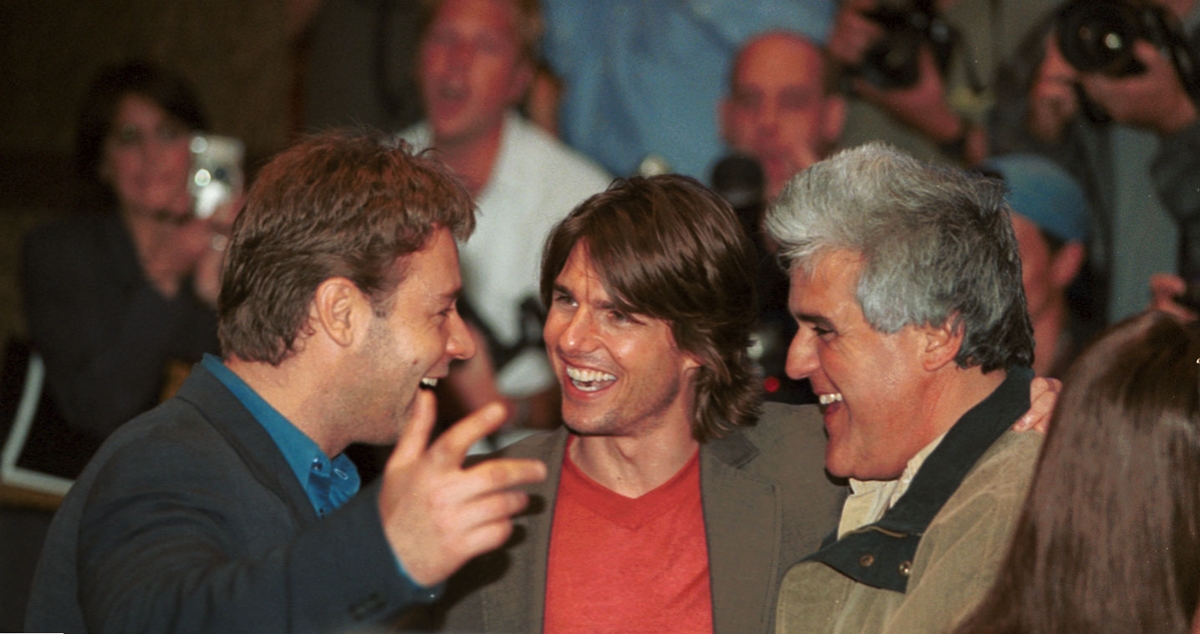 Actors Russell Crowe, Tom Cruise, and talk show host Jay Leno at the premiere Mission: Impossible II at the Empire, Leicester Square, a cinema on the north side of Leicester Square, London, on July 4, 2000