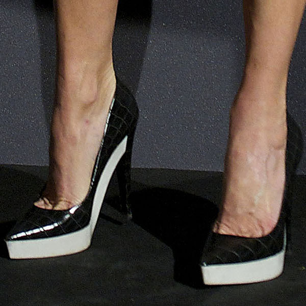 A closer look at Stella McCartney's footwear reveals the elegance of the faux crocodile platform pumps