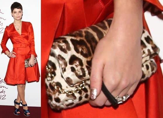 Pixie Geldof totes a leopard print foldover clutch