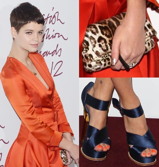 Pixie Geldof styled her red dress with a leopard print clutch and navy blue heels