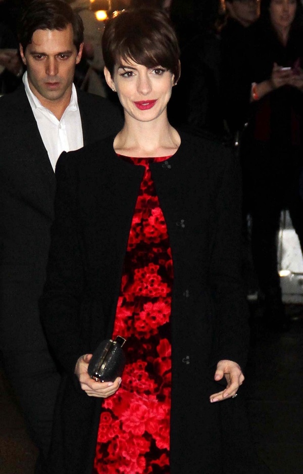 Anne Hathaway shows off her pixie-cut hairstyle at the Ed Sullivan Theater for a guest appearance on the "Late Show with David Letterman"