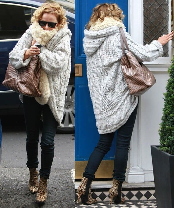 On a brisk December morning, Geri Halliwell, also known as Ginger Spice, elegantly navigates the London chill en route to a clinic, clad in chic animal print booties, a cozy cable knit sweater, and a luxurious furry scarf