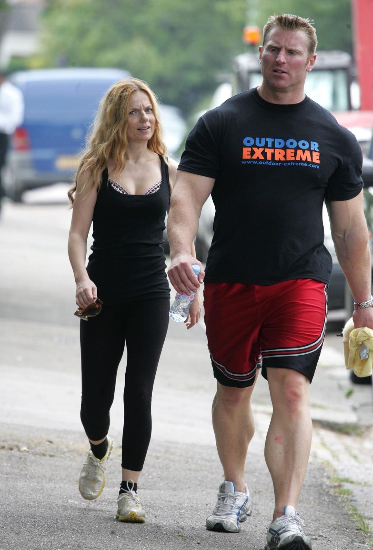 Geri Halliwell looks tiny next to her enormous personal trainer in Hampstead Heath