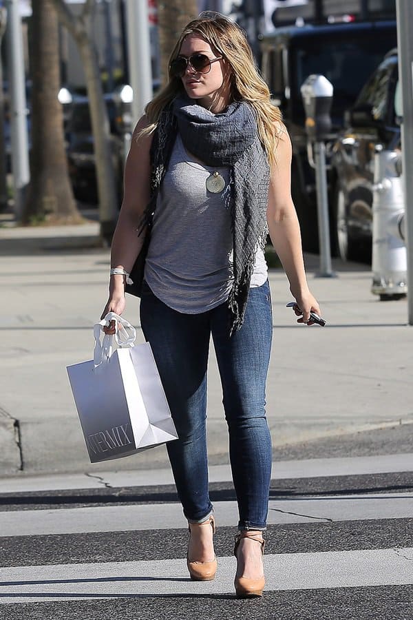 Hilary Duff was spotted in Beverly Hills on December 10, 2012, styled with Gucci GG 2887S luxury leather aviator sunglasses and Lanvin beige ankle strap platform pumps