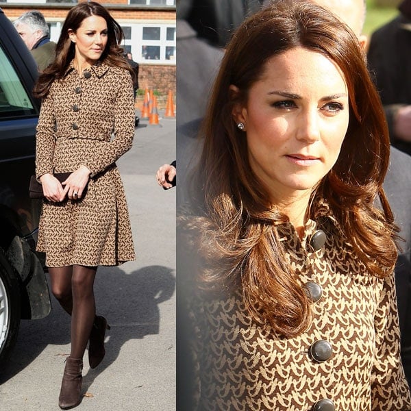 Kate Middleton looks polished in a brown patterned coat dress styled with matching brown tights and ankle boots
