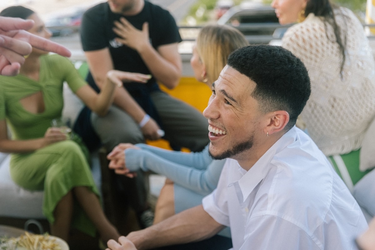 Kendall Jenner was supported by boyfriend Devin Booker as she celebrated her 818 Tequila at a rooftop party in New York