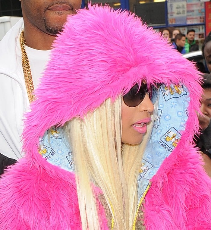 Nicki Minaj wearing a pink fur coat