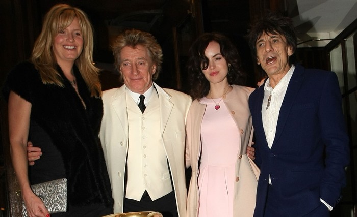 Ronnie Wood and Sally Humphreys pose with Penny Lancaster and Rod Stewart at The Dorchester hotel