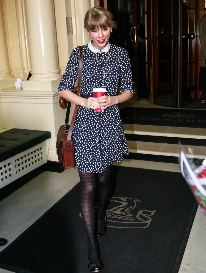 Taylor Swift was spotted wearing an NW3 dice print with a contrast collar shirt dress paired with O Jour ballet flats