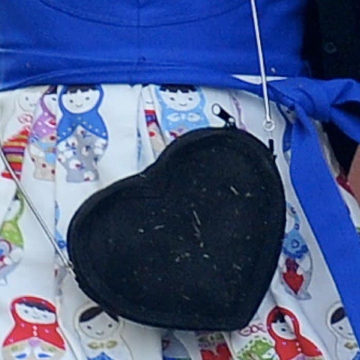 The Heart of Style: A close-up of Zooey Deschanel's distinctive heart-shaped bag, a symbol of her unique fashion sense on the 'New Girl' set, still seeking its brand identity, December 4, 2012