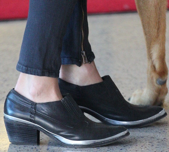 Nikki Reed's Western-inspired metal-trimmed slip-on booties