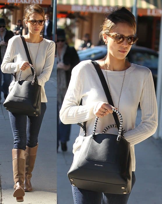 Jessica Alba shows off her black Bvlgari Serpenti tote