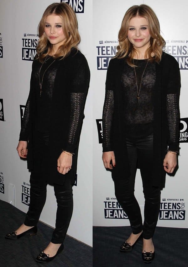 Chloe Moretz celebrated the launch of the Teens for Jeans campaign with DoSomething.org and Aeropostale, promoting jean donations for homeless teens while stylishly wearing Dominic Jones cross pendant necklace, Dolce & Gabbana stretch-leather skinny pants, and Charlotte Olympia kitty embroidered velvet flats