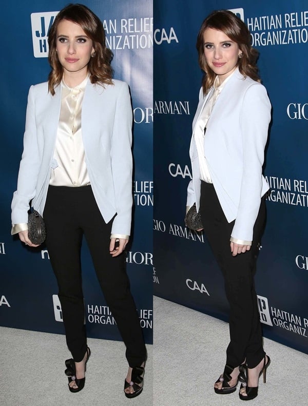 Emma Roberts exudes elegance in an Emporio Armani ensemble, complemented by a black Christian Louboutin Padam clutch