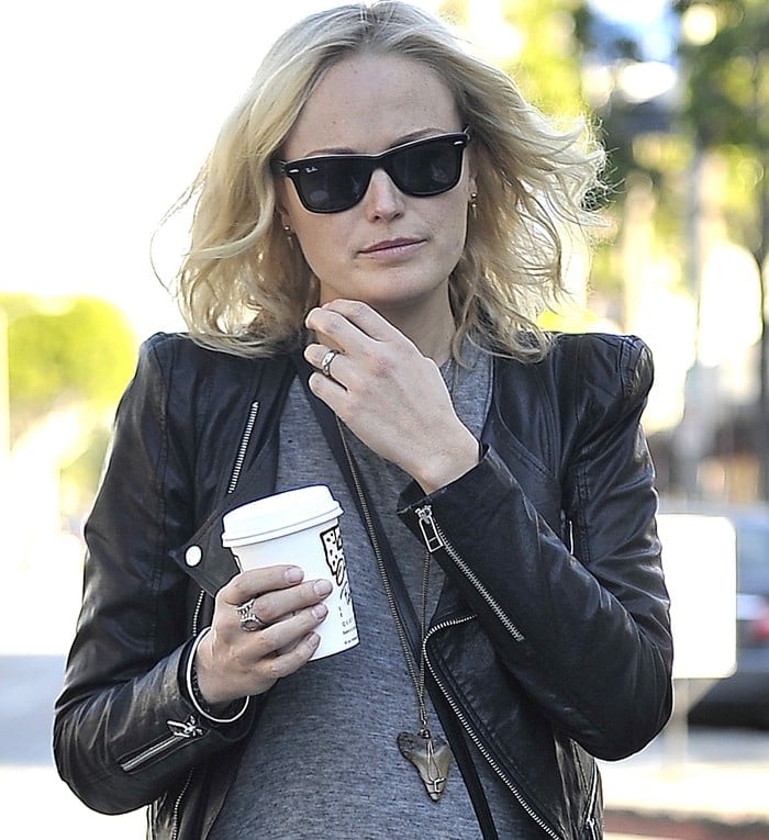 Malin Akerman wears her blonde hair down as she leaves Le Pain in West Hollywood with a coffee
