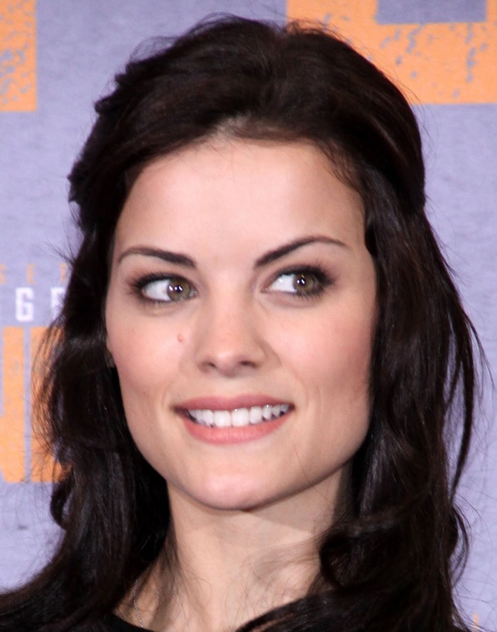 Jaimie Alexander's hair fell in soft waves on her shoulders