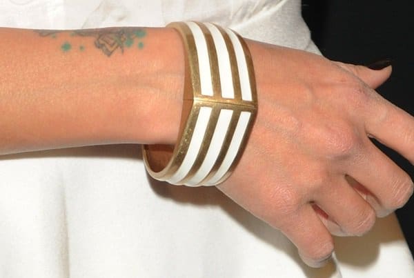 Jeannie Mai accessorized with a chic cuff bracelet