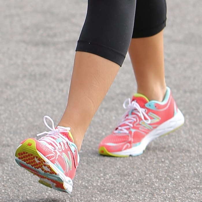 Jenna Dewan Tatum showing off her bright pink New Balance sneakers