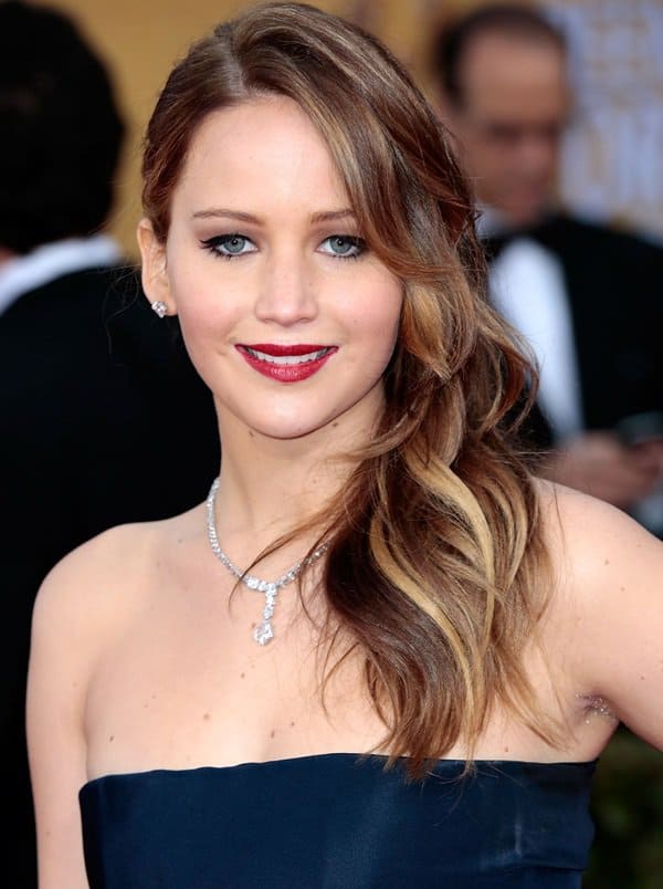 Jennifer Lawrence captivates in a Christian Dior Spring 2013 Couture midnight blue gown at the SAG Awards