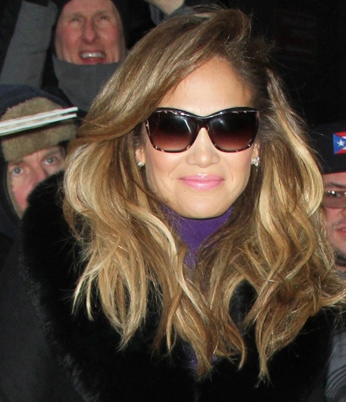 Jennifer Lopez was all glam in her fur-trimmed black coat from Diane von Furstenberg