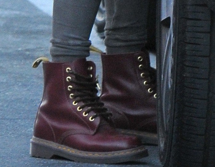 Jessica Alba wears burgundy Dr. Martens boots