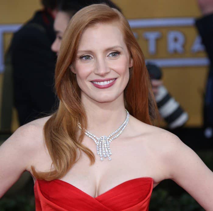 Jessica Chastain styled her red strapless Alexander McQueen dress with a Harry Winston statement necklace