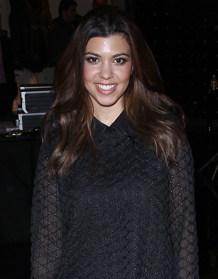 Kourtney Kardashian wears a beaded black dress to "Kardashian Khaos"