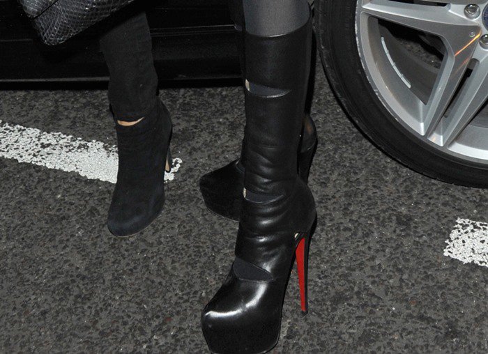 Lindsay Lohan wears dramatic red-soled platform "Bandita" boots