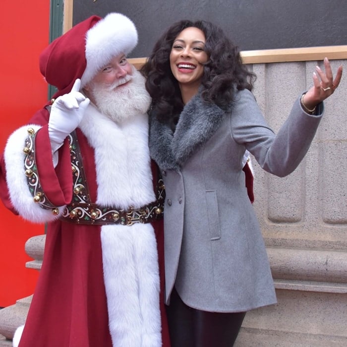 Santa Claus and singer-songwriter Keri Hilson attend Macy's Center City Holiday Window Unveiling