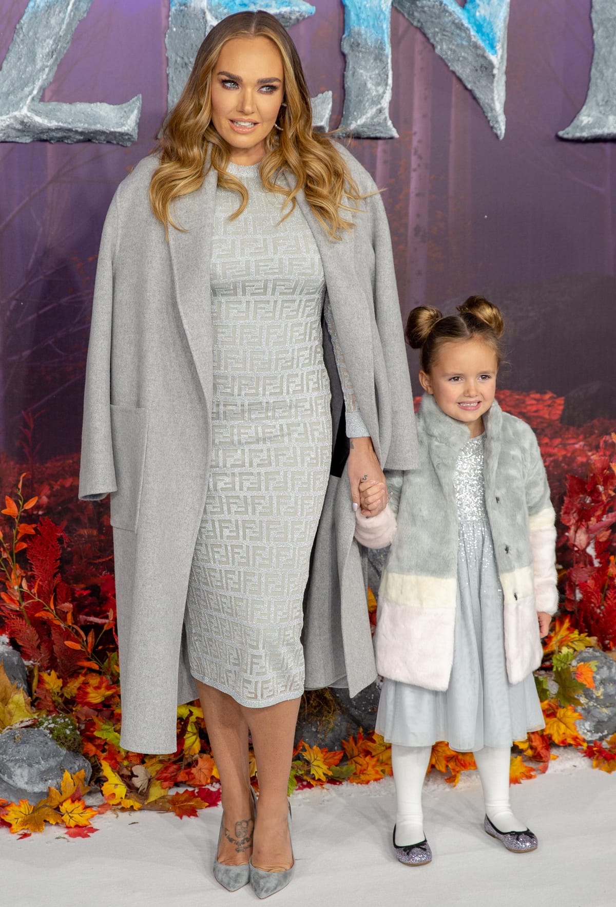 Tamara Ecclestone in a body-hugging Fendi midi dress with her daughter Sophia Ecclestone Rutland