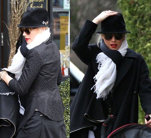 Styling a white scarf with a black outfit like Gwen Stefani is a classic and chic look
