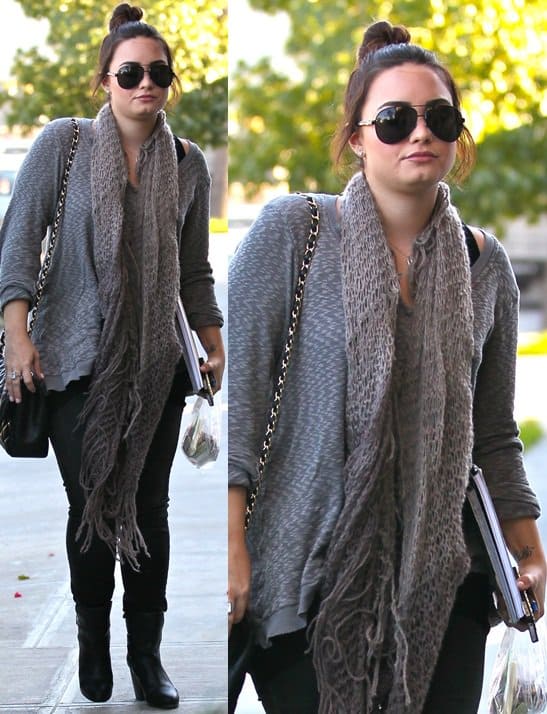 Demi Lovato wears a textured scarf on her way to a recording studio in Los Angeles