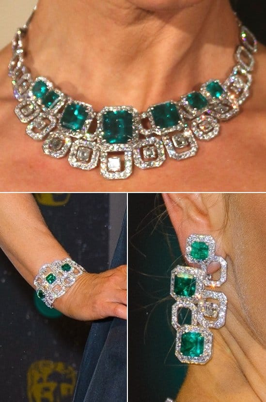 Emilia Fox shows off her ornate Columbian emerald and diamond necklace, drop earrings, and bracelet set by Adler