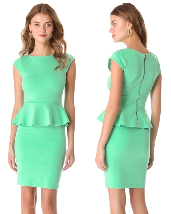 This crew-neck jersey dress from alice + olivia features a ruffled peplum and an exposed back zip