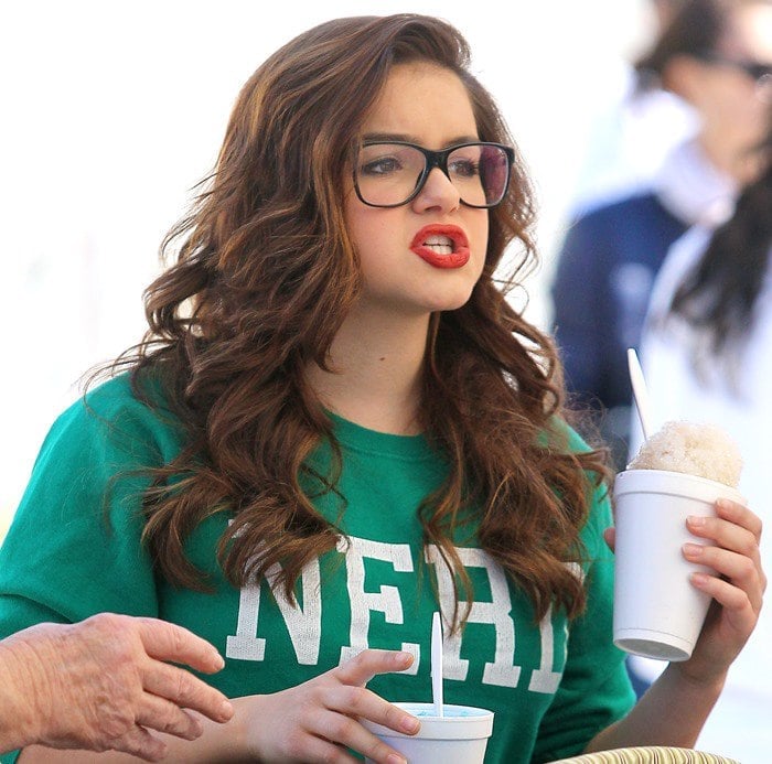 Ariel Winter wears her red hair in curls while shopping at the Studio City Farmers Market