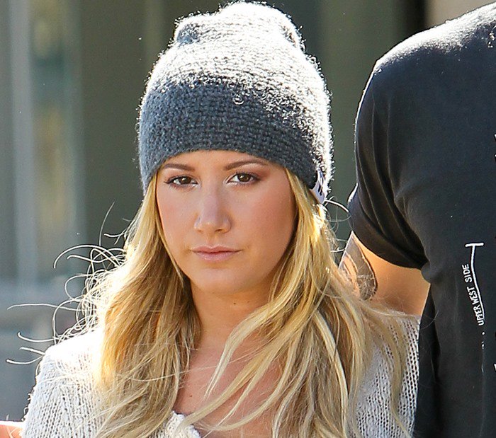 Ashley Tisdale rocks a sweater and a beanie