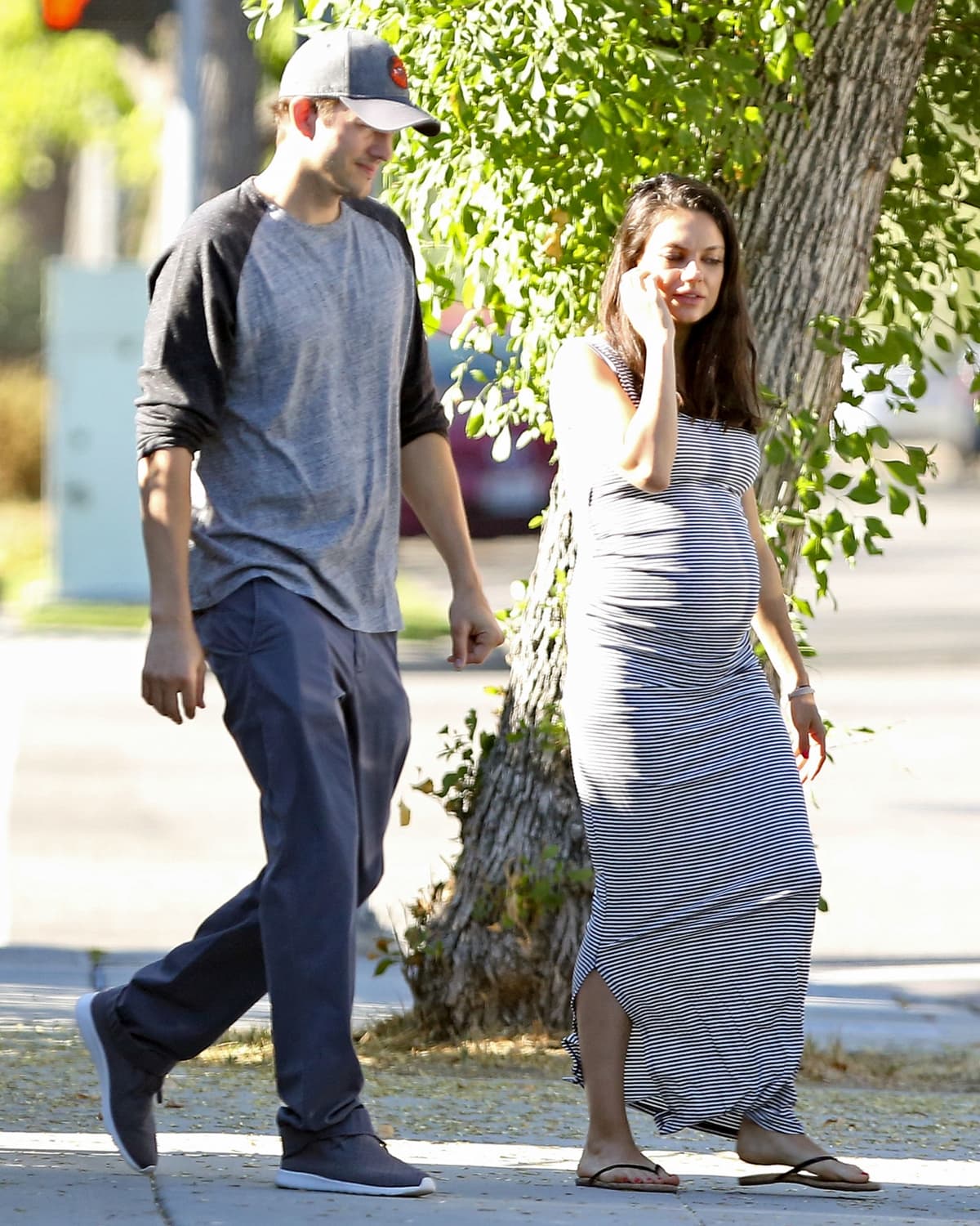 Ashton Kutcher and his pregnant wife Mila Kunis in Los Angeles
