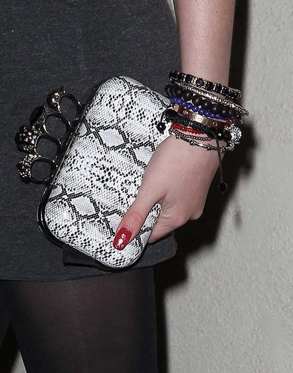 Bella Thorne's Alexander McQueen knuckle box clutch