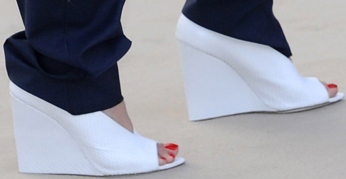 Rita Ora's feet in textured white Burberry wedges