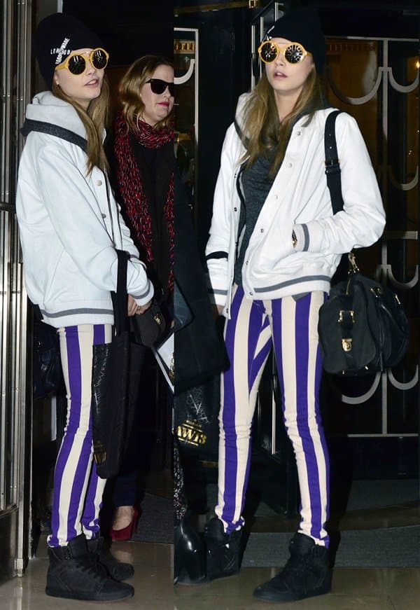 Cara Delevingne showcasing House of Holland's striped skinny jeans at London Fashion Week