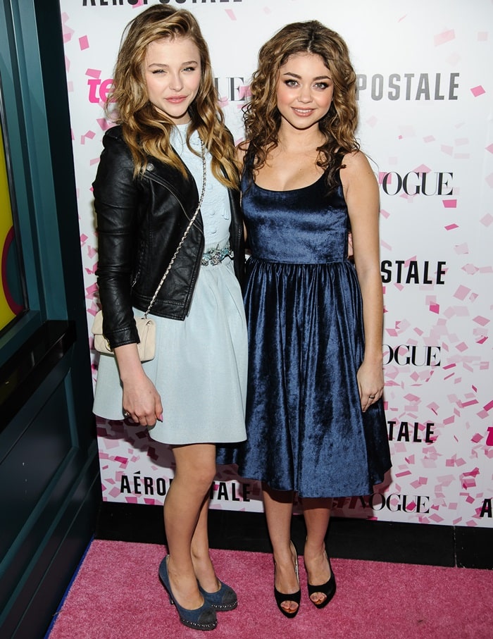 Sarah Hyland dazzles in an alice + olivia by Stacey Bendet dress alongside Chloë Grace Moretz