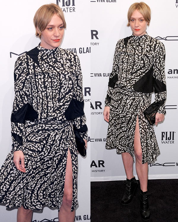 Chloë Sevigny balanced polish with edge in a black-and-white Proenza Schouler slit dress, styled with tough-chic lace-up ankle booties and a sleek black clutch